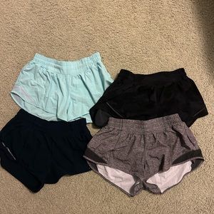 four pairs of lululemon hotty hot shorts size 6!!!
